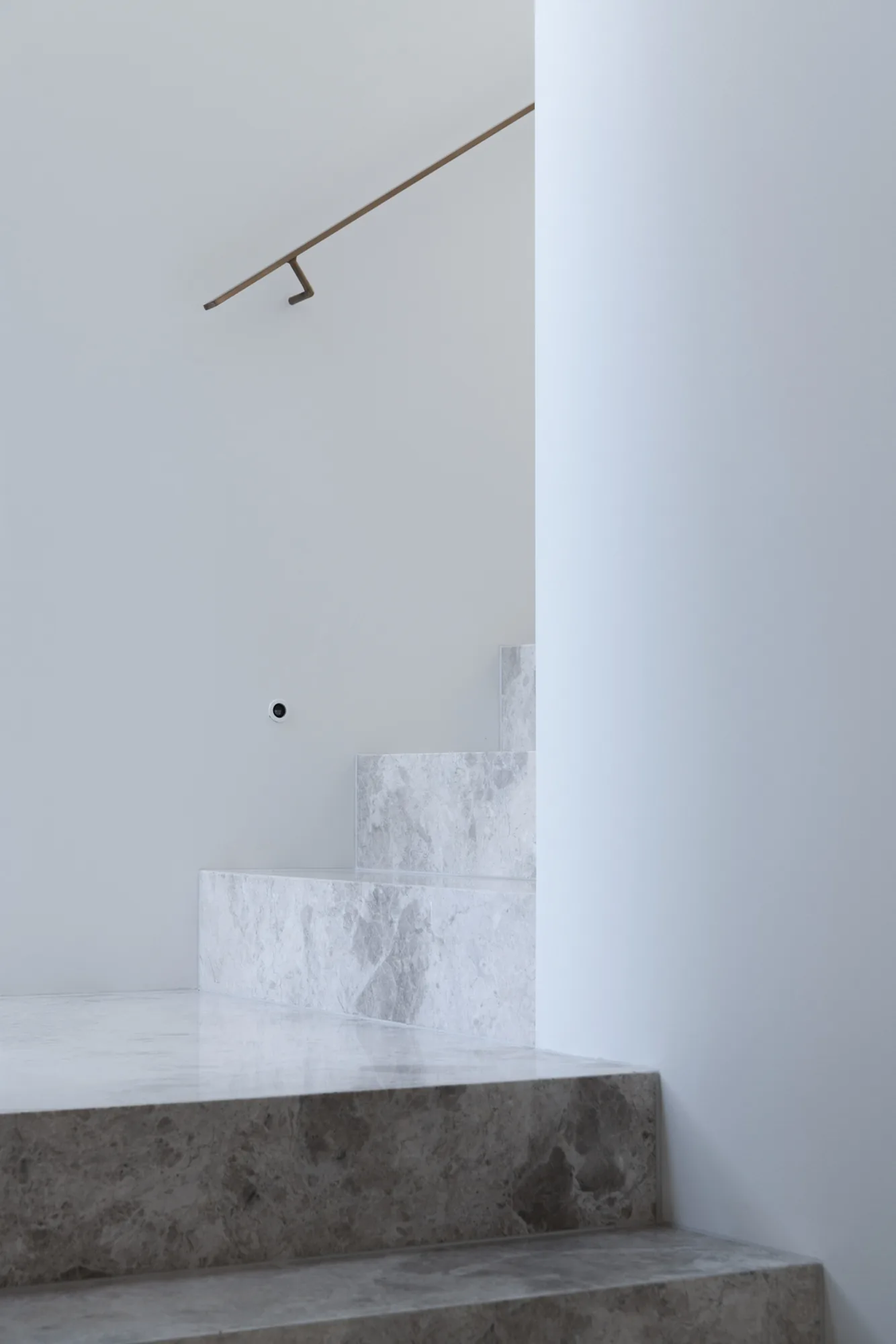 Marble stair treads and landing in an architectural coastal home at Terrigal